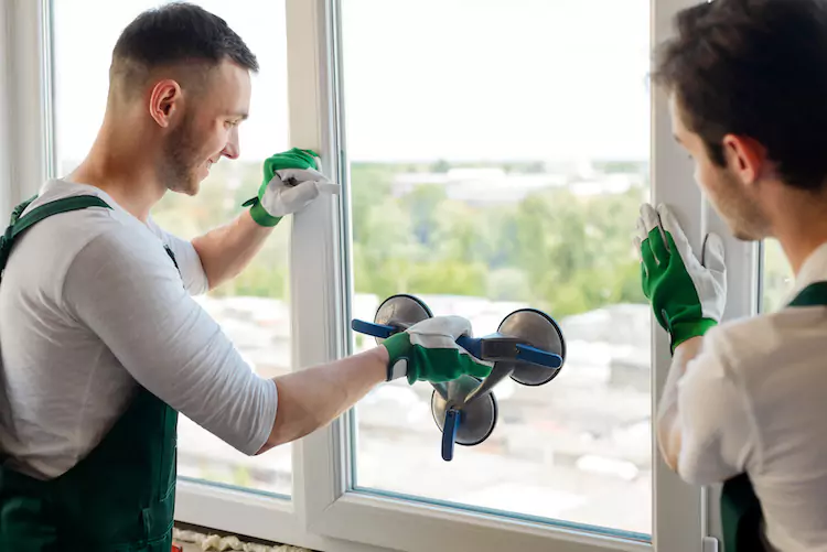 glazier-insurance-fitting-65d831a01e44a Insured glaziers fitting a window